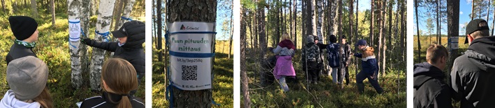 Nuoria metsässä suorittamassa mittaustehtäviä.